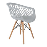 Hollow out plastic armchair with eiffel wood legs